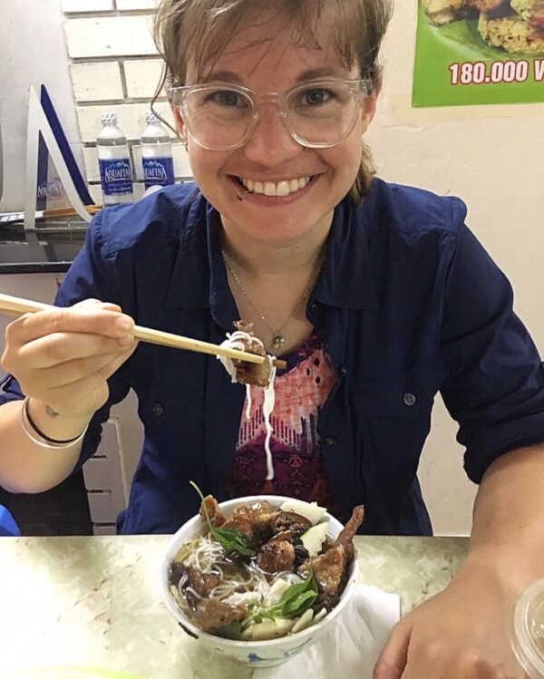 Courtney eating bun cha Hanoi - best meals to eat in Hanoi