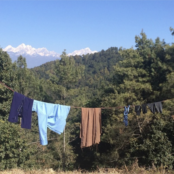 Laundry Hanging in front of the Himalayas
