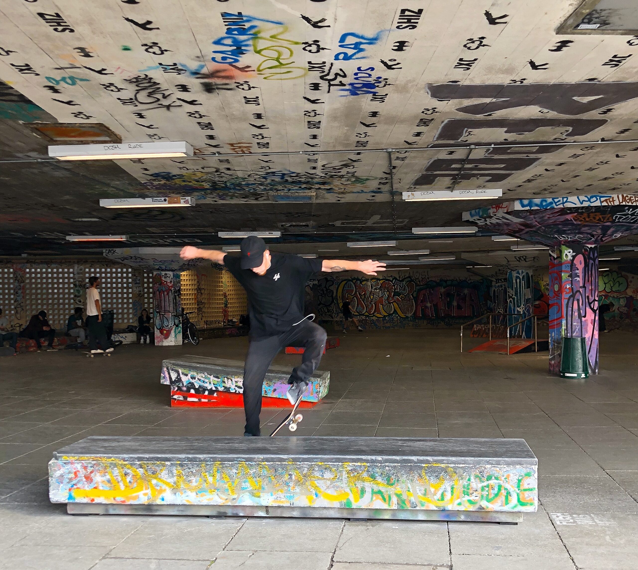 Man Skateboarding on a rail at theSouth Bank Undercroft Skate Park