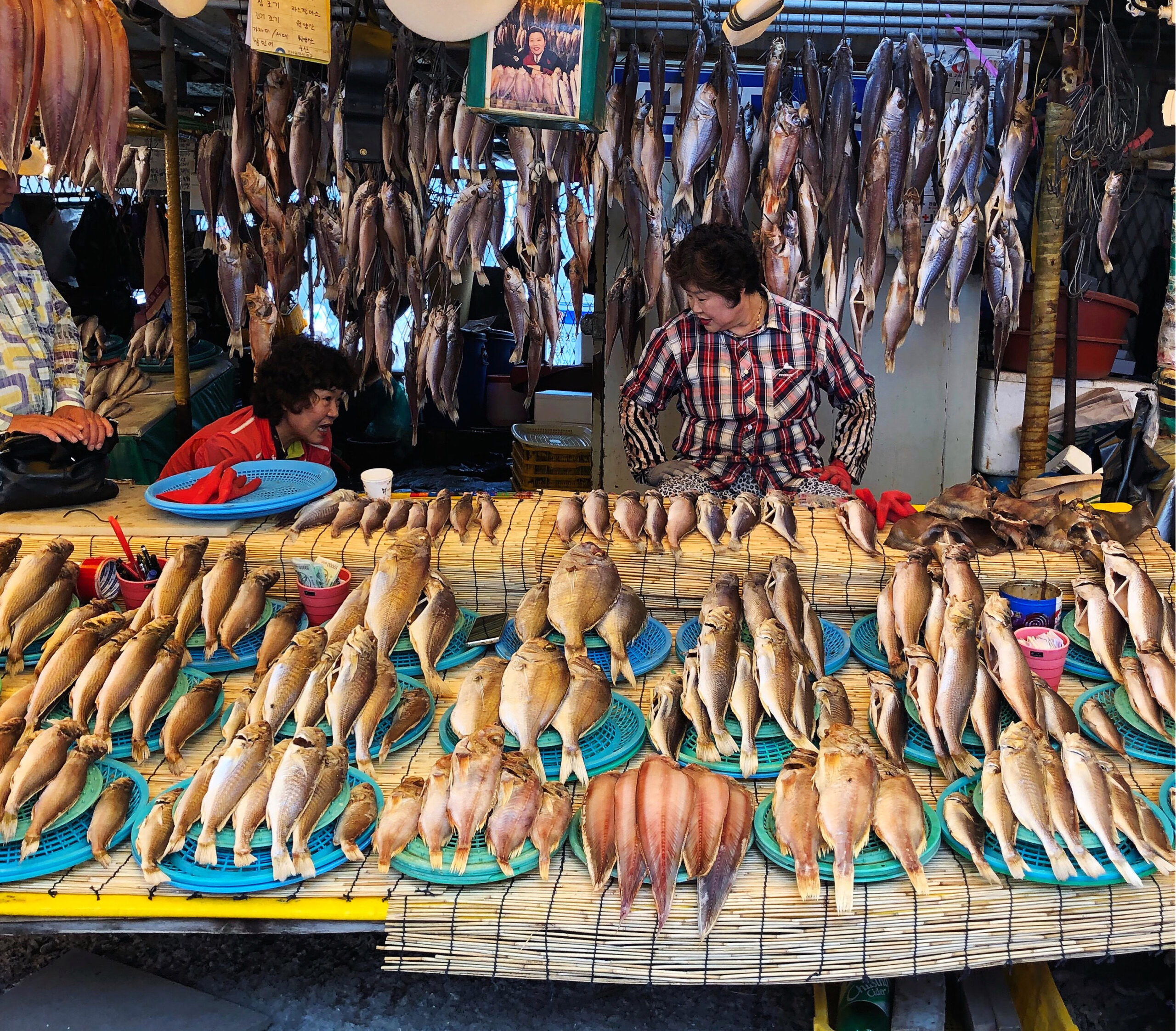 Women selling fish at Jagalchi Market in Busan South Korea