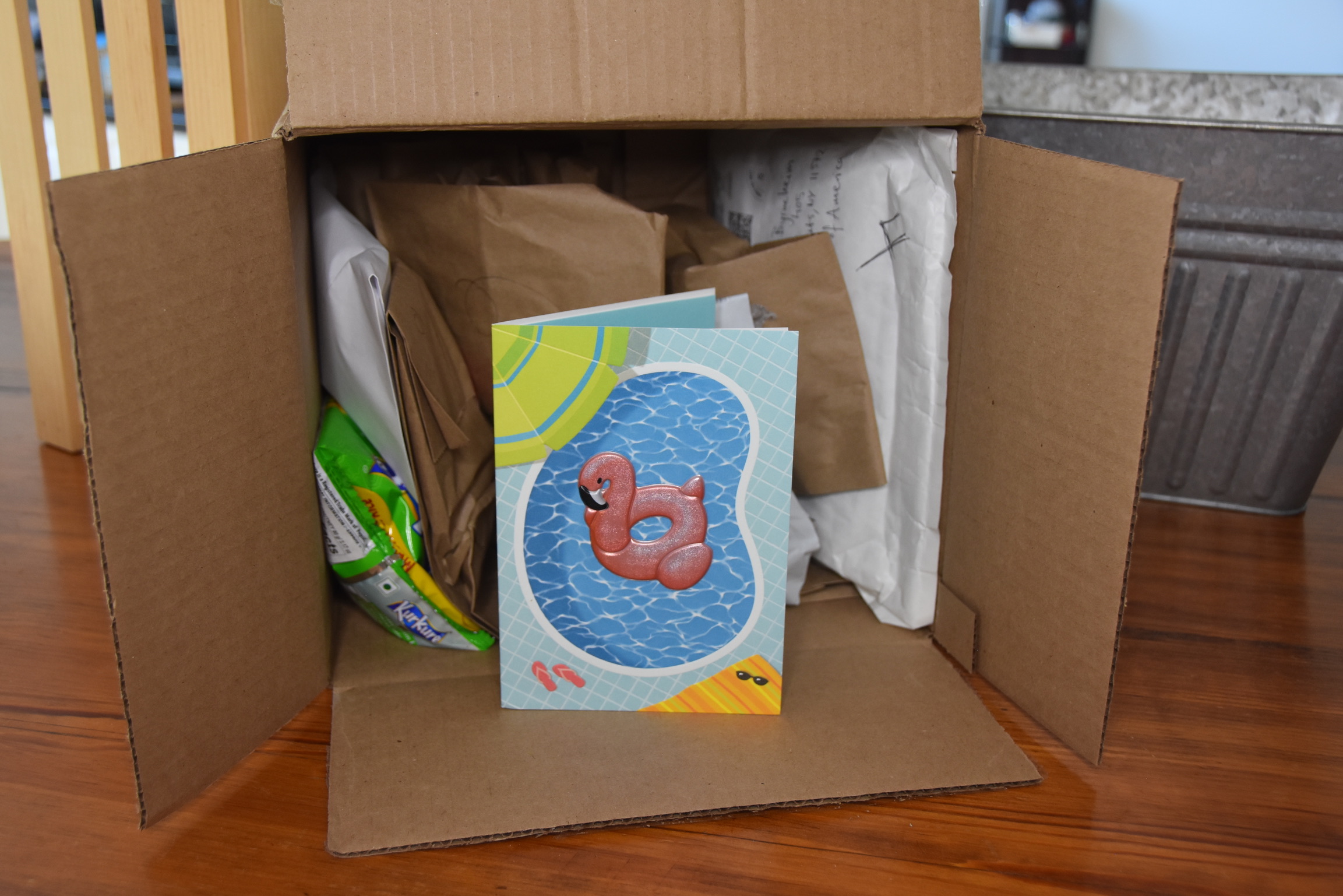 My First DIY Global Snack Box Being Opened with a Fun Card