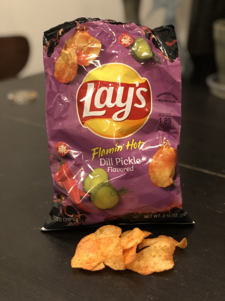 Flamin Hot Dill Pickle Lay's Potato Chip Bag with chips in front