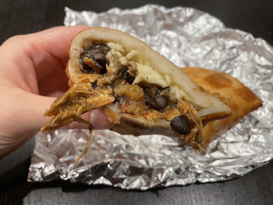 Inside of a Paballon Empanada with beef, beans, cheese and plaintain.