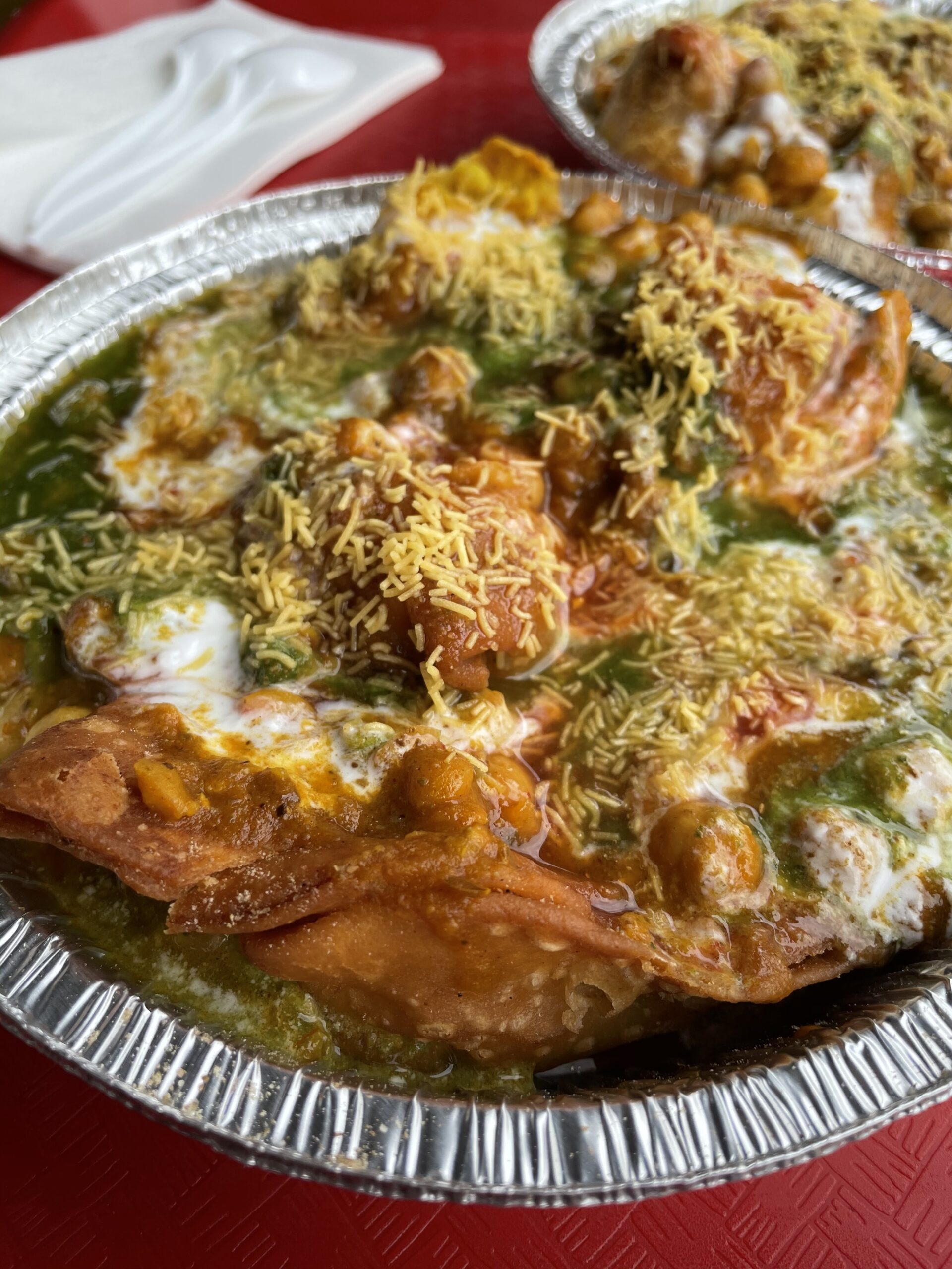 Samosa Chaat from Raja Sweets & Fast Food on a table