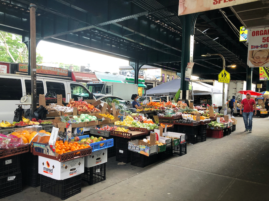 Produce for sale along Roosevelt Avenue in Queens