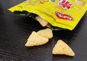 Polinkies coming out of the bag onto a black table