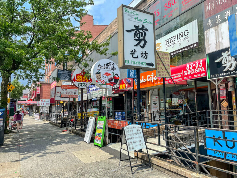 Street scene on Broadway in Elmhurst Queens featuring Asian Businesses