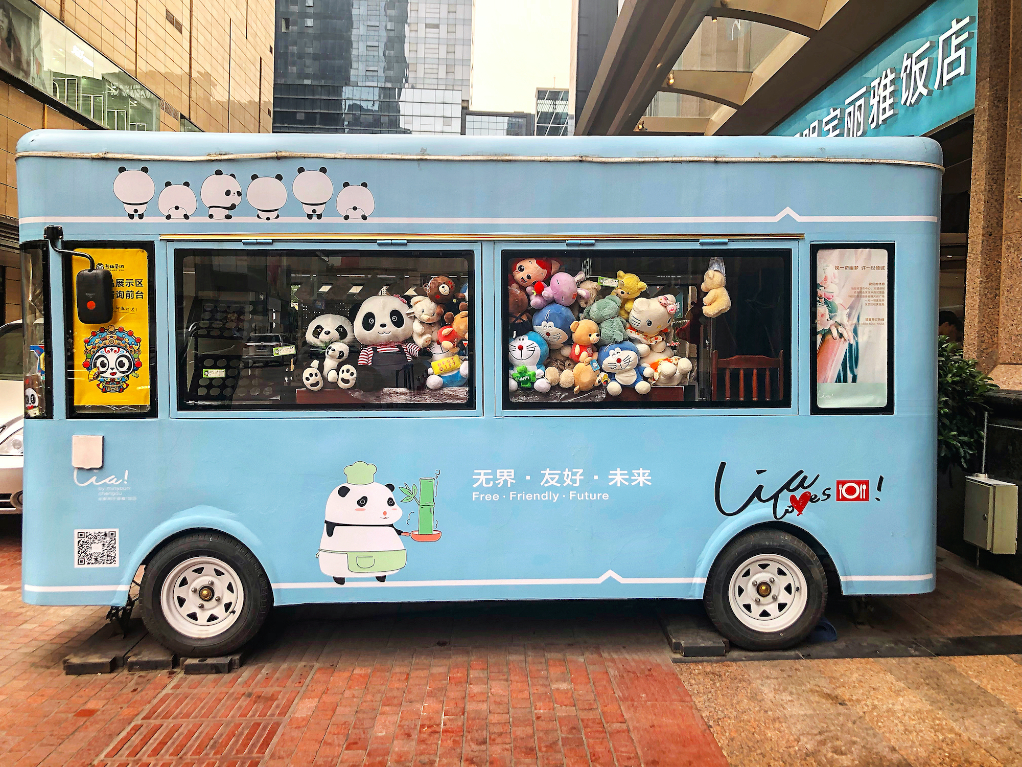 Bus Outside the Lia Hotel in Chengdu Filled with Panda Toys and Images