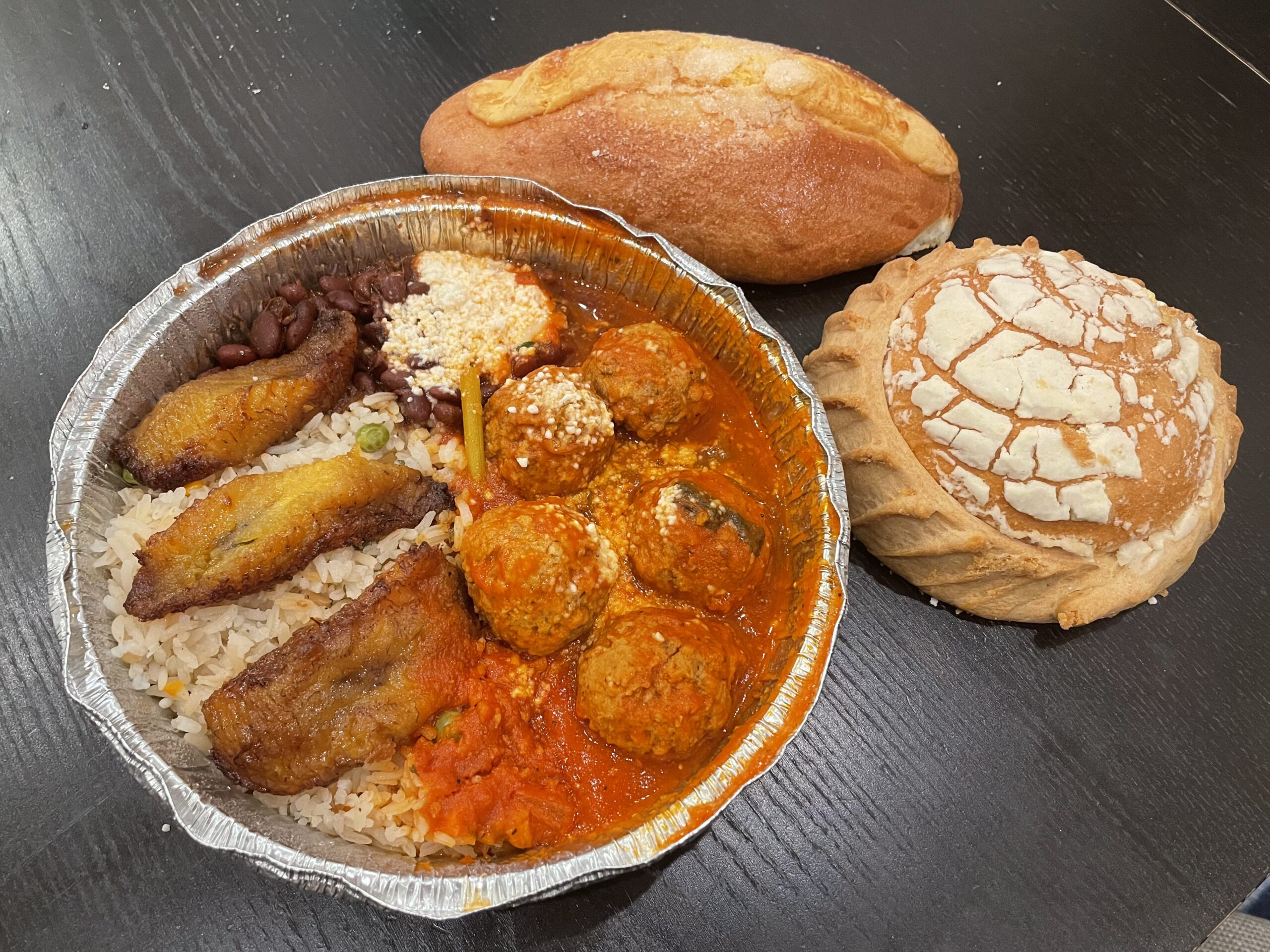 Too Good To Go Meal from La Adelita de Woodside - plantains and rice and beans, meatballs and 2 sweet breads