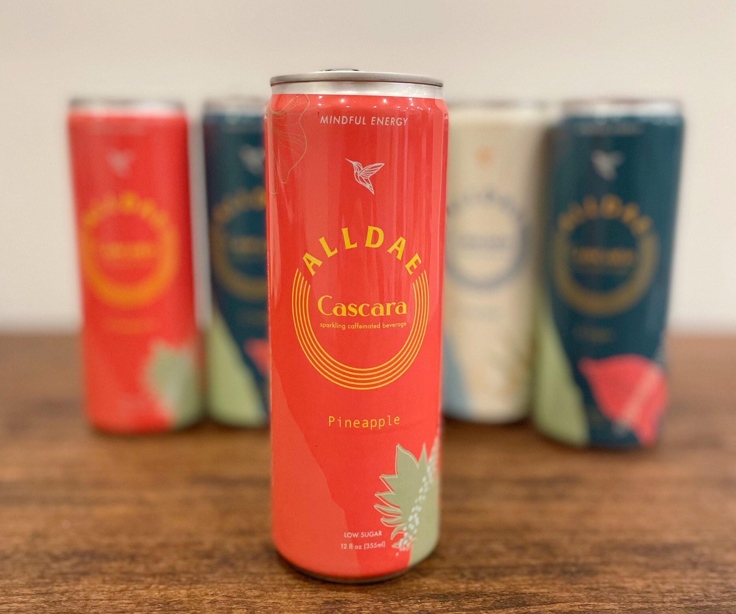 All Dae Sparkling Cascara Pineapple Flavor with other flavors in the background