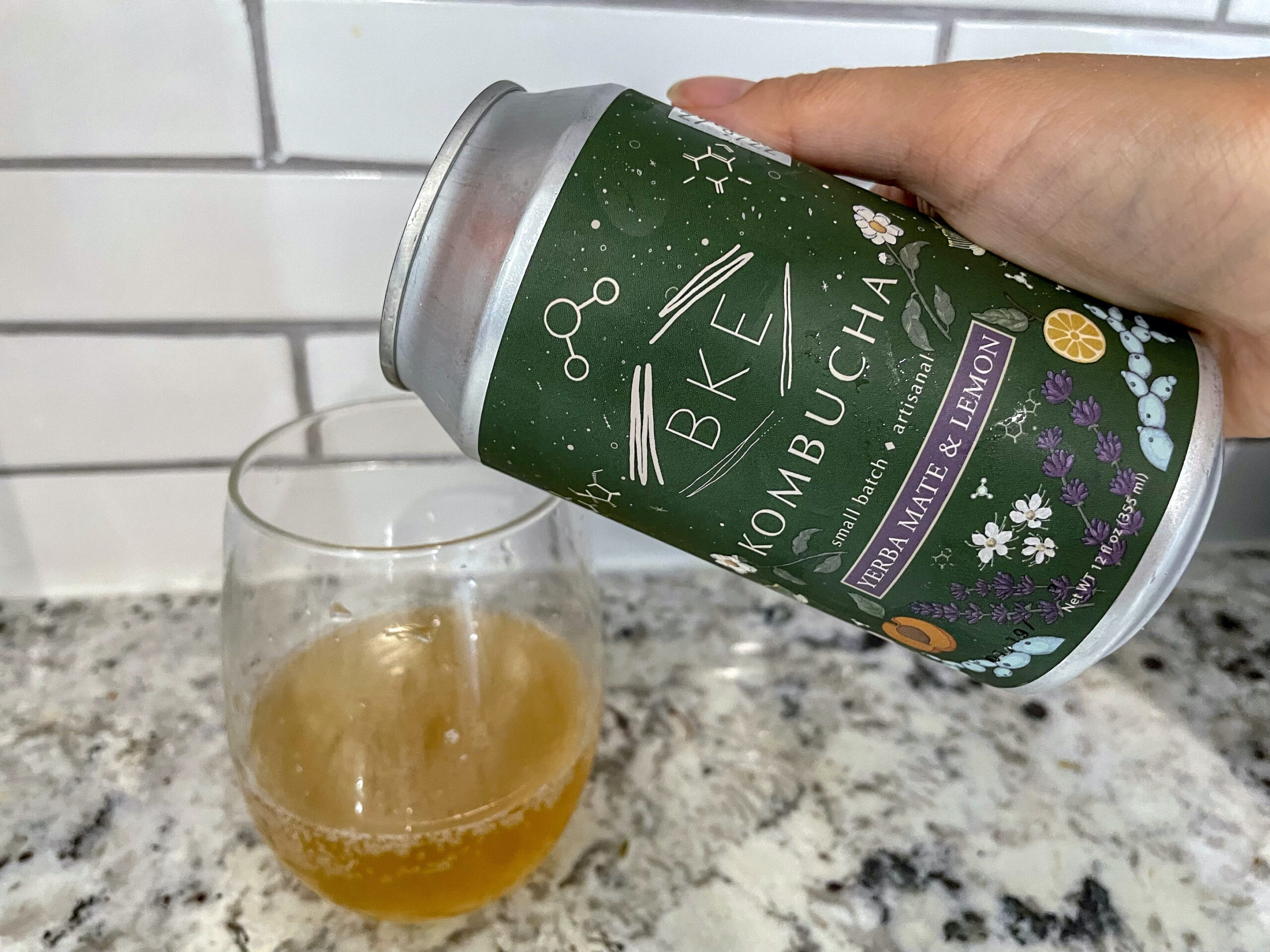 BKE Yerba Mate Lemon Kombucha being poured into a glass