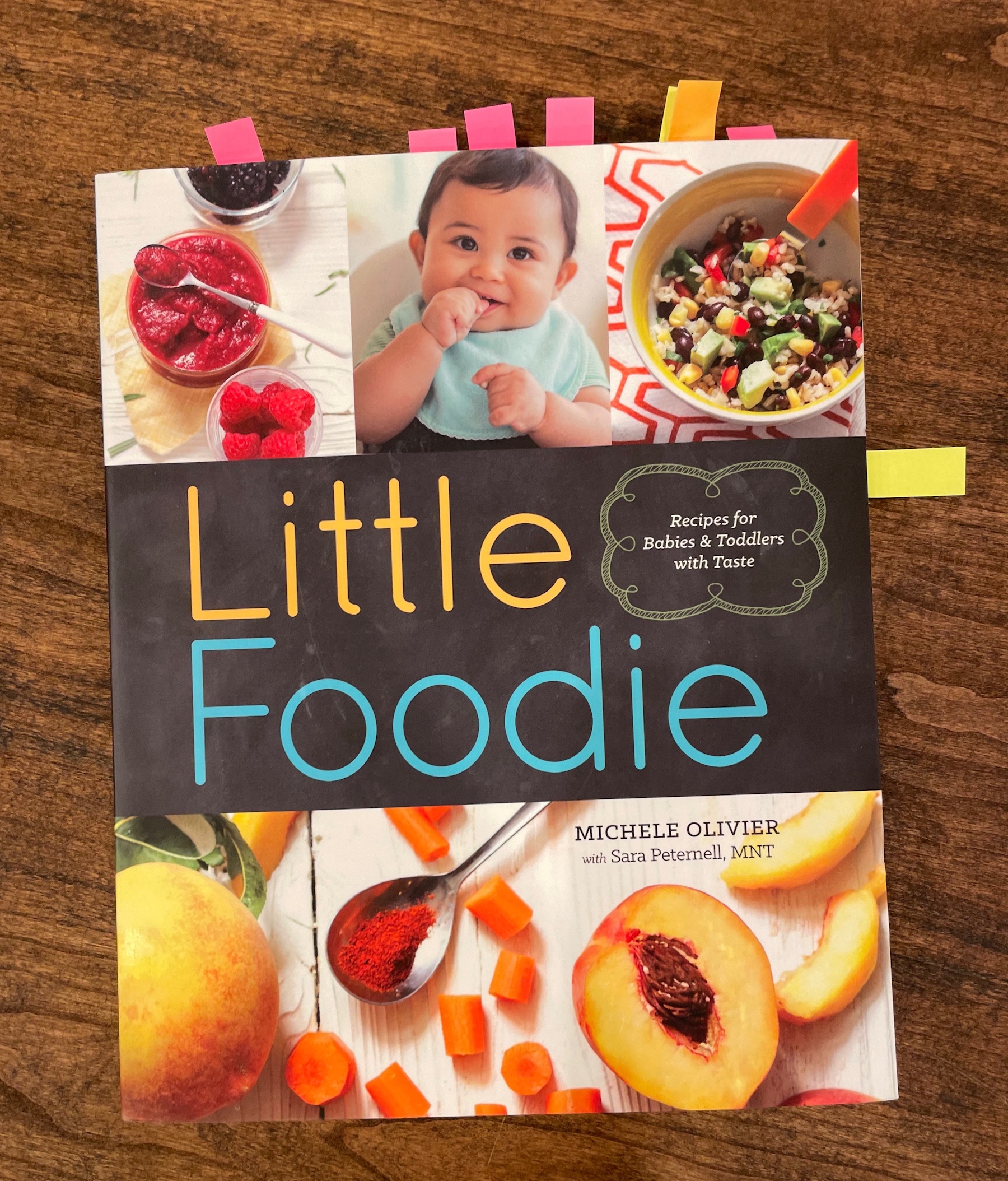 Little Foodie Cookbook Cover with post-its marking recipes to try