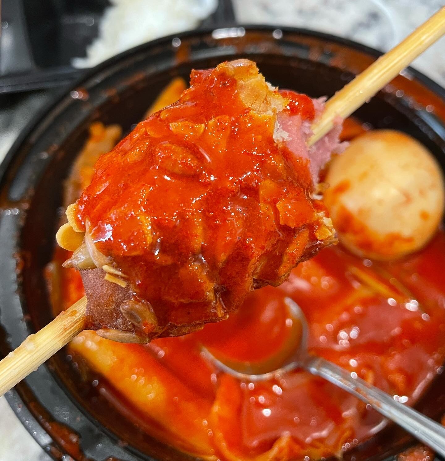 Korean Corn Dog Dipped in Tteokbokki Sauce