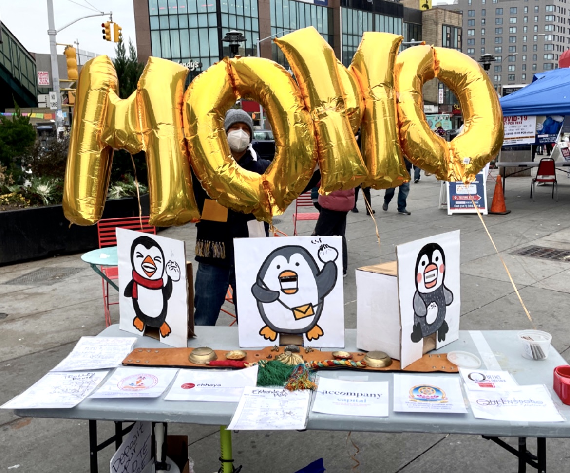 Momo voting station and balloons from the 2022 Jackson Heights Momo Crawl