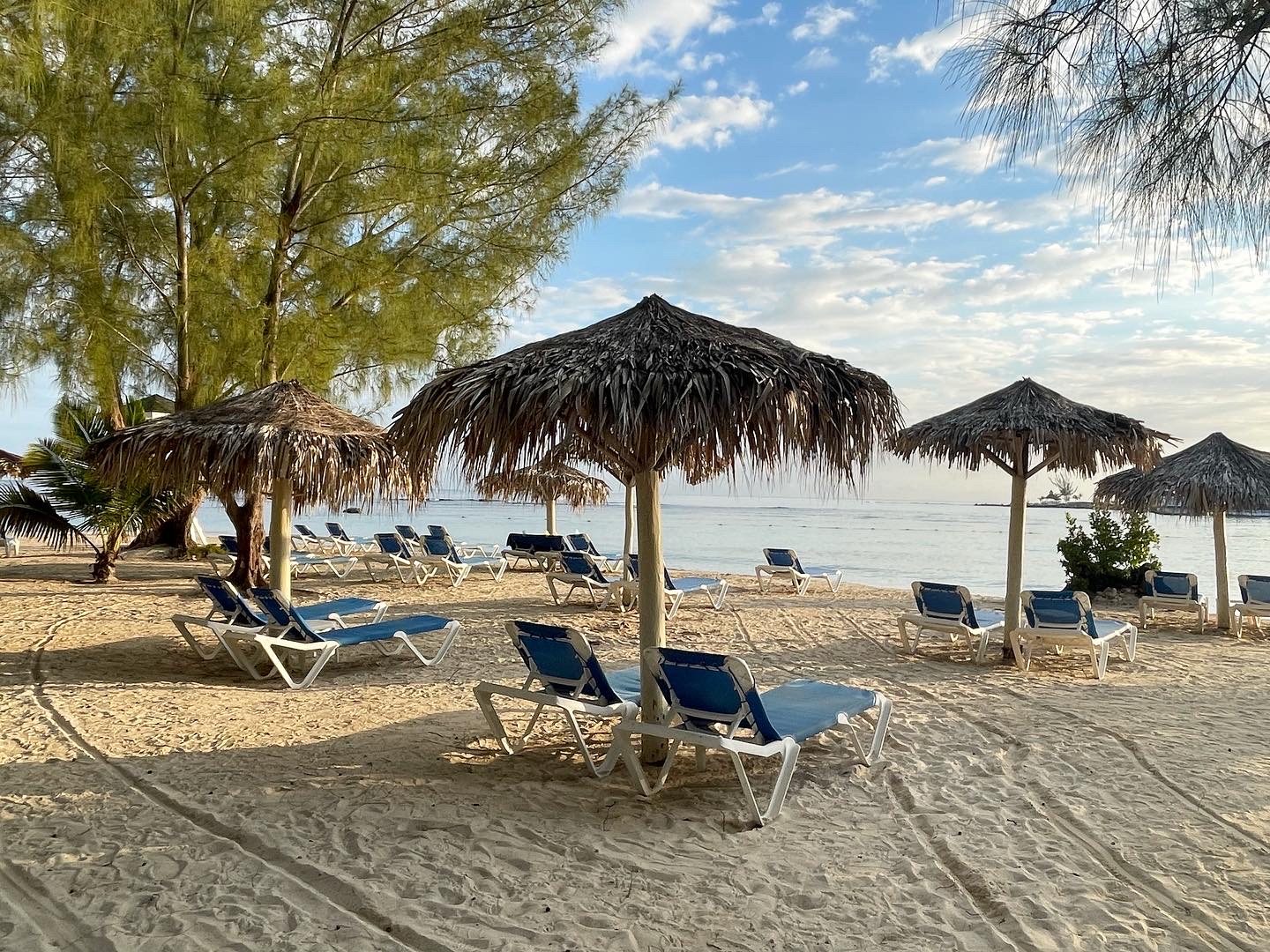 Beach chairs on the sand at the Grand Bahia Principe Resort in Runaway Bay, Jamaica