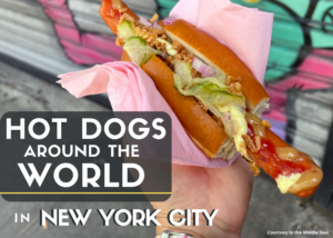 Cover photo for a blog post about Hot Dogs from Around the World in New York City featuring a Swedish Hot Dog with street art in the background