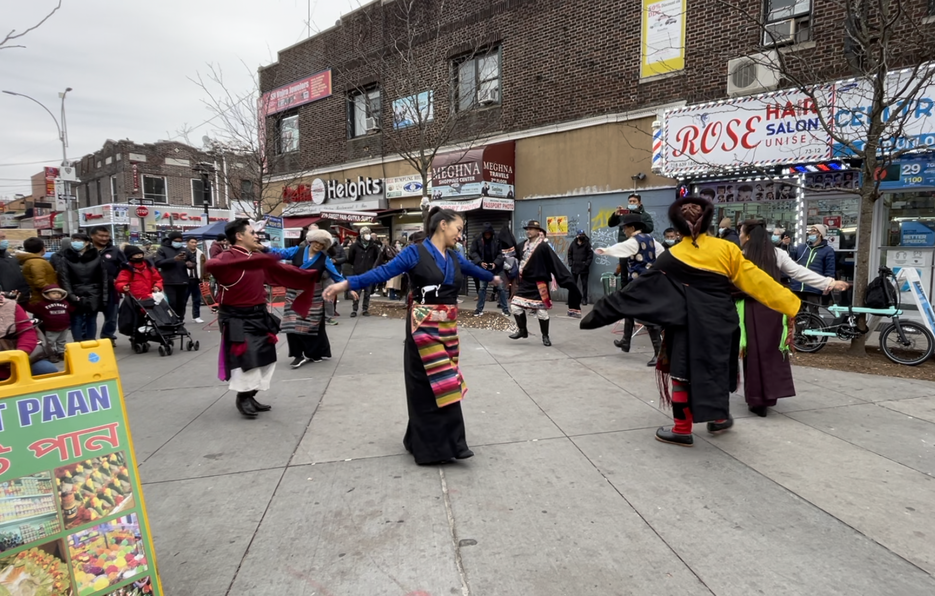 Tibetan traditional dance performance in Diversity Plaza in Jackson Heights at the Momo Crawl